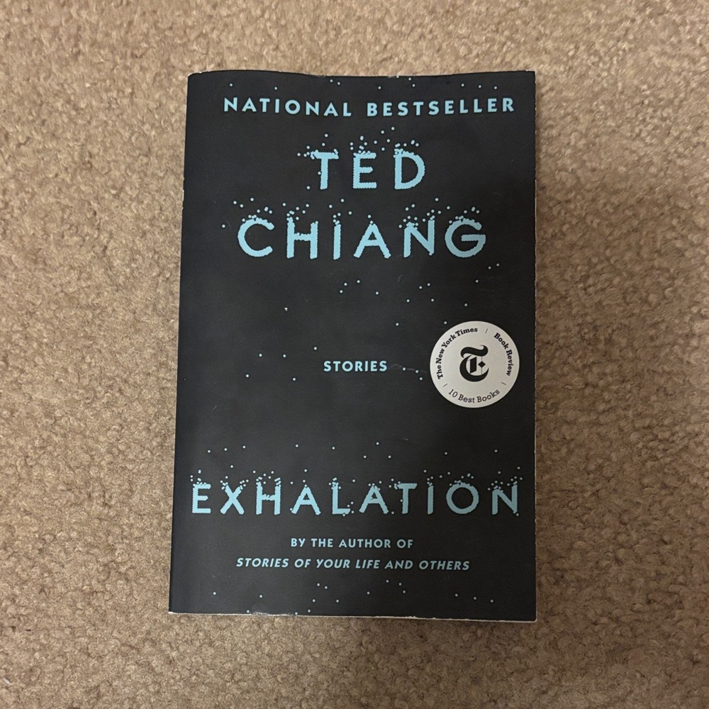 Exhalation by Ted Chiang Book - Black Cover with Light Blue Text